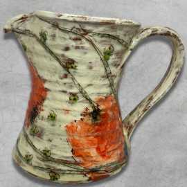 Orange flower pitcher