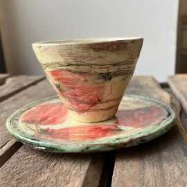Conical espresso cup and its saucer